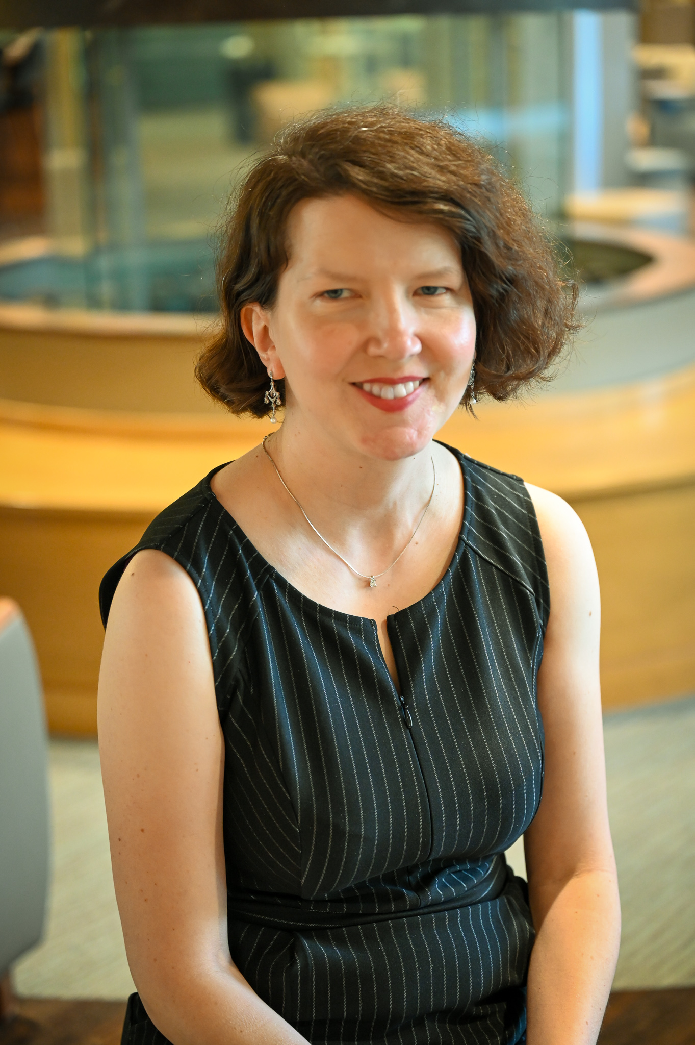 natasha brandstatter sitting down and looking very professional